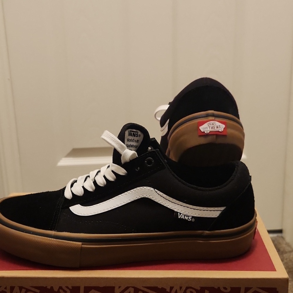 Black and white vans with gum sole